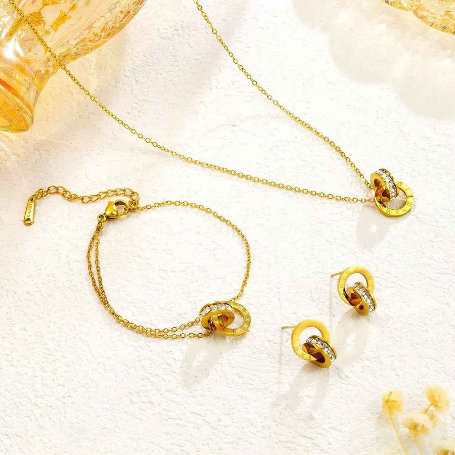 Roman Numeral Interlocking Ring Jewellery Set – Necklace, Bracelet & Earrings | طقم مجوهرات الحلقات الرومانية